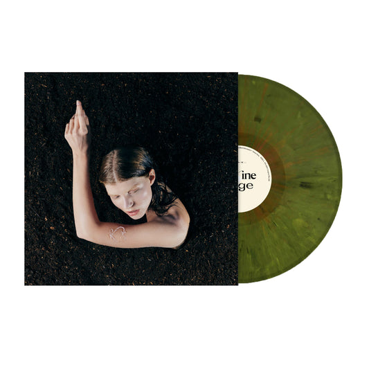 An Elke green Eco-mix Vinyl record peeks out of its album cover, which shows a woman rising from dark soil with one arm raised, gazing up toward the camera.