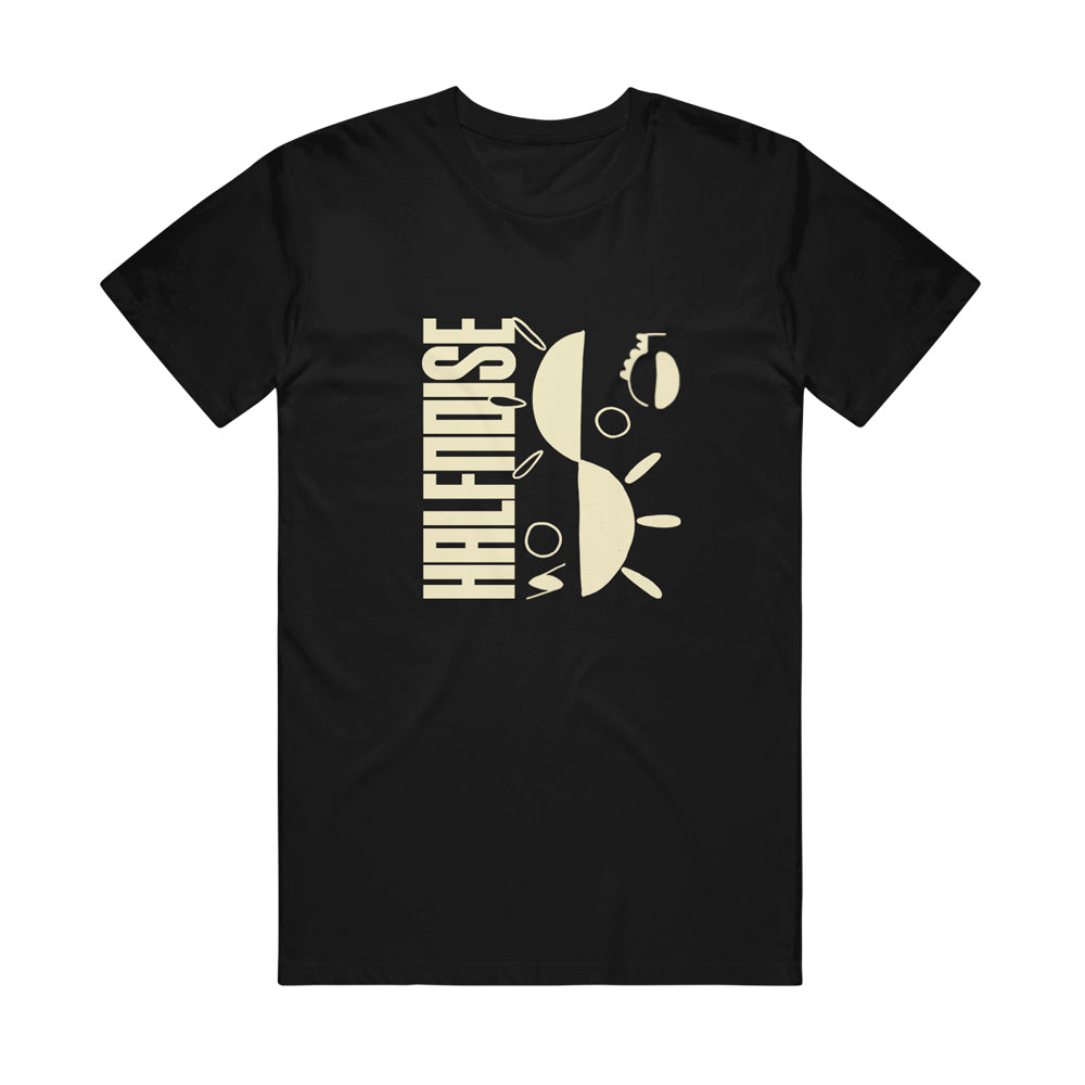 image of a black tee shirt on a white backgound. tee has center chest print in creme that says halfnoise vertically on the left and then a sun cut in two parts stacked on the right