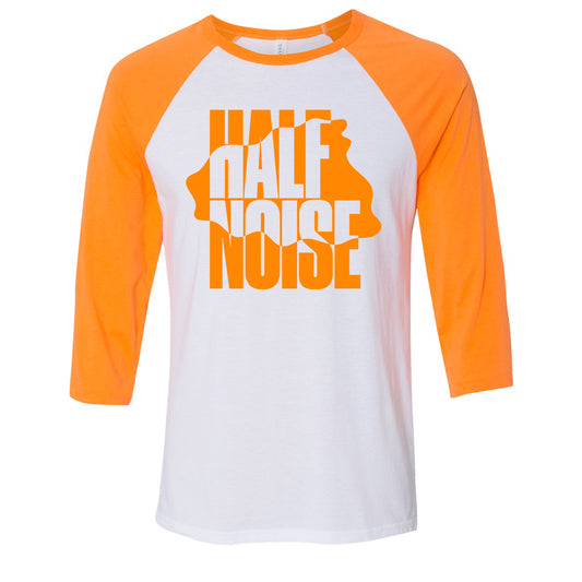 image of a white and orange sleeved baseball tee shirt on a white background. tee has center print in orange and white, in a wave like design that says half noise. 